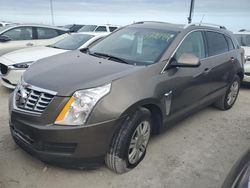 Flood-damaged cars for sale at auction: 2014 Cadillac SRX Luxury Collection