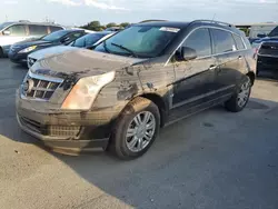 Flood-damaged cars for sale at auction: 2010 Cadillac SRX