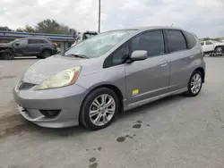 Flood-damaged cars for sale at auction: 2010 Honda FIT Sport