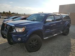 Salvage cars for sale from Copart Mentone, CA: 2015 Toyota Tacoma Double Cab Long BED