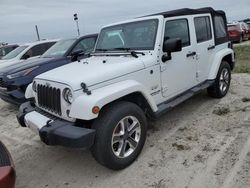 Flood-damaged cars for sale at auction: 2016 Jeep Wrangler Unlimited Sahara