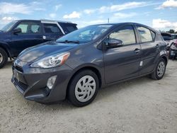 Flood-damaged cars for sale at auction: 2015 Toyota Prius C