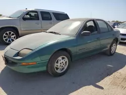 Salvage cars for sale at San Antonio, TX auction: 1997 Pontiac Sunfire SE