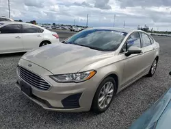 Flood-damaged cars for sale at auction: 2019 Ford Fusion SE