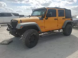 Flood-damaged cars for sale at auction: 2012 Jeep Wrangler Unlimited Sport