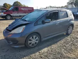 Honda salvage cars for sale: 2011 Honda FIT Sport