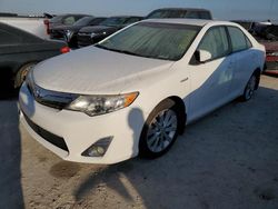 2014 Toyota Camry Hybrid en venta en Riverview, FL