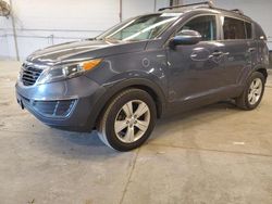 Salvage cars for sale at Wheeling, IL auction: 2011 KIA Sportage LX