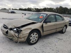 Salvage cars for sale from Copart New Braunfels, TX: 2001 Ford Taurus LX