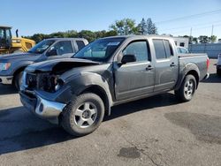 Salvage trucks for sale at Ham Lake, MN auction: 2008 Nissan Frontier Crew Cab LE