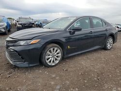 Carros dañados por inundaciones a la venta en subasta: 2019 Toyota Camry L