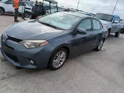 Carros salvage para piezas a la venta en subasta: 2014 Toyota Corolla L