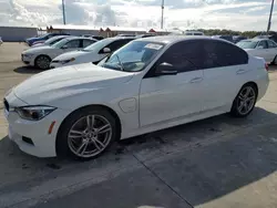 Carros dañados por inundaciones a la venta en subasta: 2017 BMW 330E