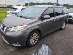 Salvage cars for sale at auction: 2011 Toyota Sienna XLE