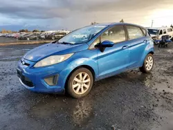 Salvage cars for sale from Copart Eugene, OR: 2011 Ford Fiesta SE