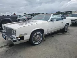 Carros dañados por inundaciones a la venta en subasta: 1984 Cadillac Eldorado