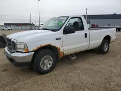 Salvage trucks for sale at Nisku, AB auction: 2003 Ford F250 Super Duty