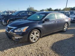 Carros dañados por inundaciones a la venta en subasta: 2014 Nissan Altima 3.5S