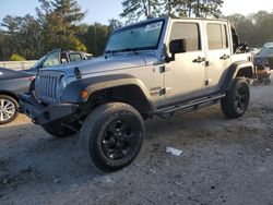 Salvage cars for sale at Greenwell Springs, LA auction: 2013 Jeep Wrangler Unlimited Sport