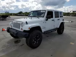 Salvage cars for sale at Riverview, FL auction: 2012 Jeep Wrangler Unlimited Sahara