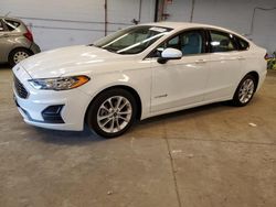 Salvage cars for sale at Wheeling, IL auction: 2019 Ford Fusion SE