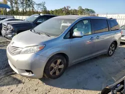 Flood-damaged cars for sale at auction: 2015 Toyota Sienna LE