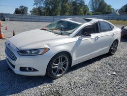 Flood-damaged cars for sale at auction: 2016 Ford Fusion Titanium