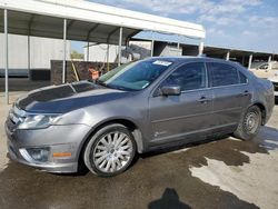 Salvage cars for sale at Fresno, CA auction: 2010 Ford Fusion Hybrid