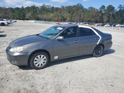 Flood-damaged cars for sale at auction: 2005 Toyota Camry LE