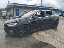 Carros dañados por inundaciones a la venta en subasta: 2016 Tesla Model X