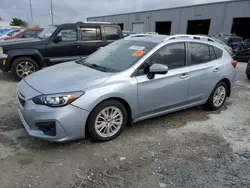 Salvage cars for sale from Copart Jacksonville, FL: 2017 Subaru Impreza Premium