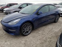 Flood-damaged cars for sale at auction: 2023 Tesla Model 3