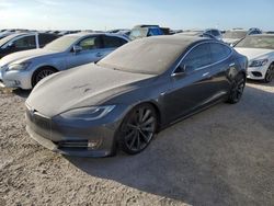 Flood-damaged cars for sale at auction: 2016 Tesla Model S