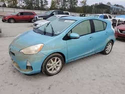 Flood-damaged cars for sale at auction: 2014 Toyota Prius C