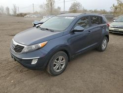 Salvage cars for sale at Montreal Est, QC auction: 2011 KIA Sportage LX