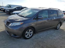 Salvage cars for sale at Arcadia, FL auction: 2014 Toyota Sienna LE