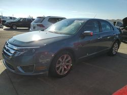 Carros dañados por inundaciones a la venta en subasta: 2012 Ford Fusion SEL