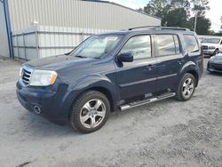 Flood-damaged cars for sale at auction: 2012 Honda Pilot EXL