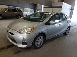 Flood-damaged cars for sale at auction: 2014 Toyota Prius C