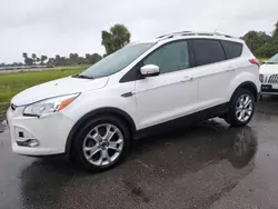 Flood-damaged cars for sale at auction: 2016 Ford Escape Titanium