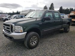 Salvage trucks for sale at Graham, WA auction: 2000 Ford F350 SRW Super Duty