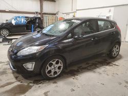 Salvage cars for sale at Nisku, AB auction: 2013 Ford Fiesta Titanium