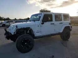 Salvage cars for sale at Orlando, FL auction: 2015 Jeep Wrangler Unlimited Sahara