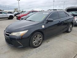 Carros dañados por inundaciones a la venta en subasta: 2015 Toyota Camry LE