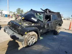 Salvage cars for sale at Pekin, IL auction: 2013 Jeep Wrangler Unlimited Sahara