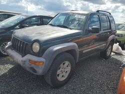 Carros dañados por inundaciones a la venta en subasta: 2002 Jeep Liberty Sport