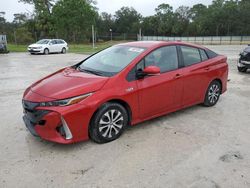 Salvage cars for sale from Copart Fort Pierce, FL: 2021 Toyota Prius Prime LE