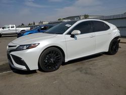 Salvage cars for sale at Bakersfield, CA auction: 2022 Toyota Camry XSE