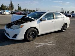 Salvage cars for sale from Copart Rancho Cucamonga, CA: 2013 Toyota Camry Hybrid