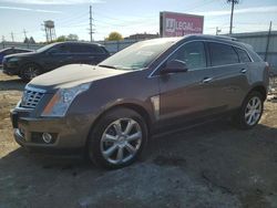 Vehiculos salvage en venta de Copart Chicago Heights, IL: 2014 Cadillac SRX Premium Collection